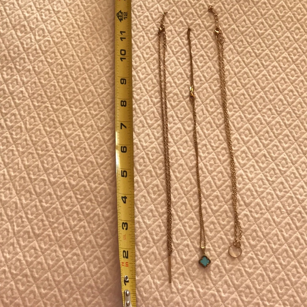 Set of 3 gold toned necklaces